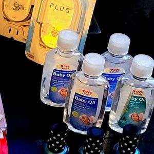 4 bottles of Baby Oil